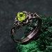 Elegant Peridot Lotus Ring - Nature-Inspired Silver Band with Leaf Detail