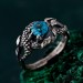 Azure Coil: Gothic Snake Ring with Blue Topaz