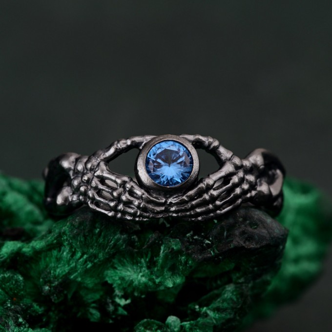 Celtic Knot Blue Topaz Fantasy Ring with Skeleton Hand Design - Gothic Engagement Jewelry