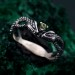 Emerald Coil: Gothic Snake Ring with Peridot