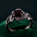 Garnet Serpent Ring with Vintage Dragon Scale Design