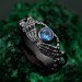 Celtic Knot Blue Topaz Fantasy Ring with Skeleton Hand Design - Gothic Engagement Jewelry