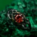 Mystical Forest Ring with Garnet and Leafy Blossom Design