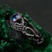 Celtic Knot Blue Topaz Fantasy Ring with Skeleton Hand Design - Gothic Engagement Jewelry