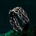 Gothic Silver Ring with Serpent and Emerald Design