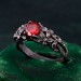 Gothic Silver Ring with Garnet and Floral Design