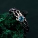 Waves of Serenity: Gothic Blue Topaz Ring