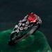 Gothic Silver Ring with Garnet and Floral Design
