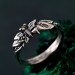 Unique Peridot Twig Engagement Ring - Nature-Inspired Sterling Silver Design with Butterfly