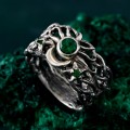 Gothic Silver Ring with Emerald and Radiant Motif